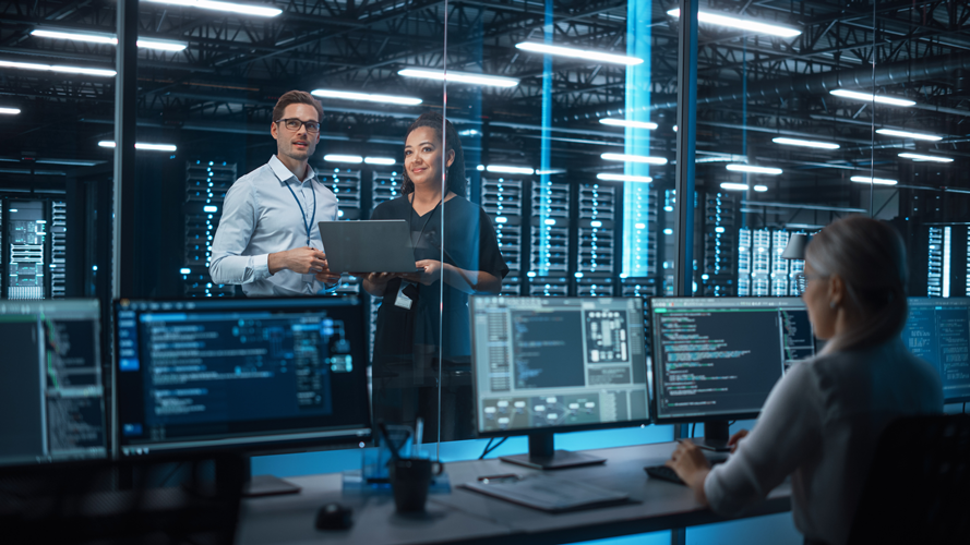 Server room and coding screens